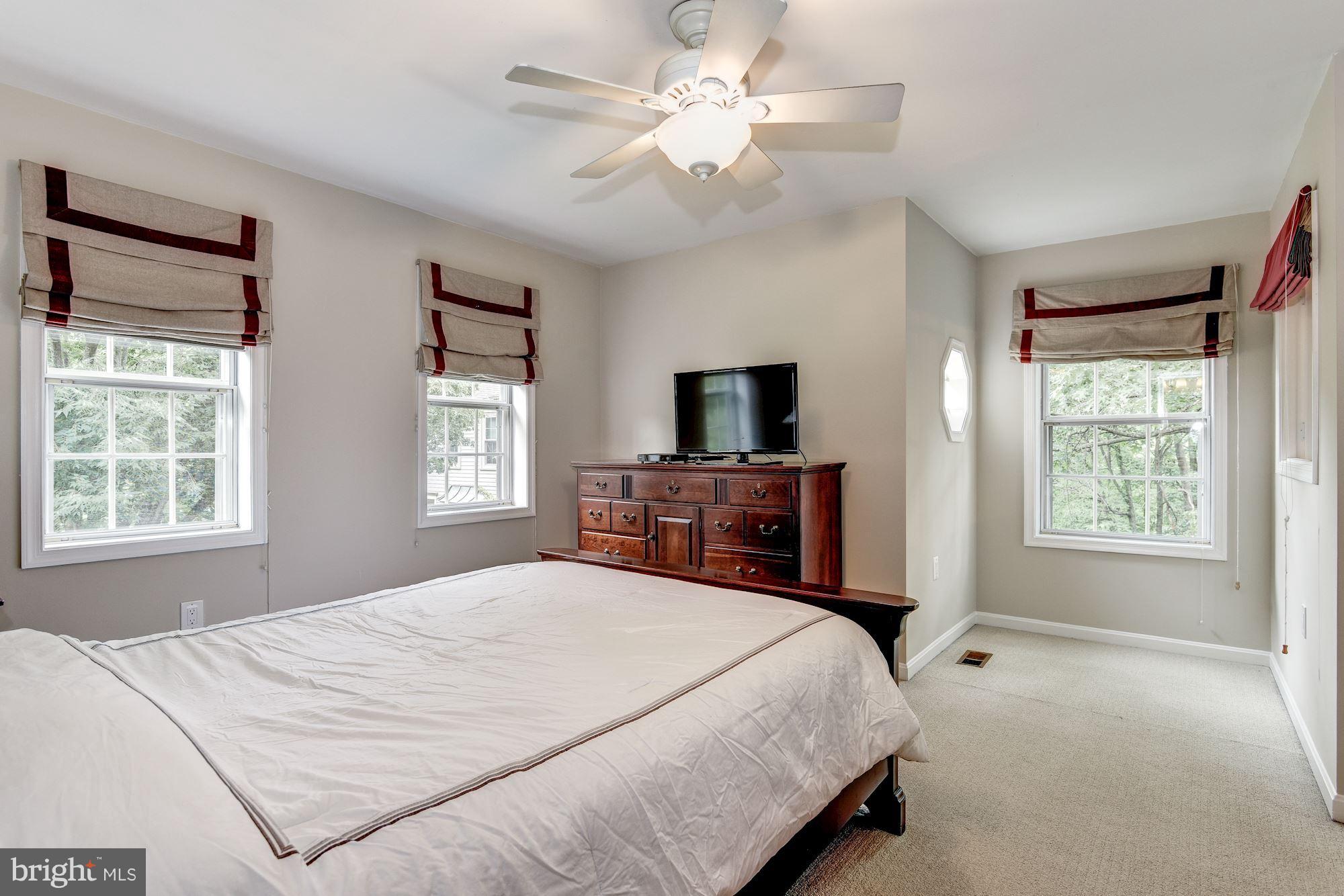11943 Sentinel Point Court Reston, VA 20191 - Photo 16 of 27 Sitting Area and Roman Fabric Shades