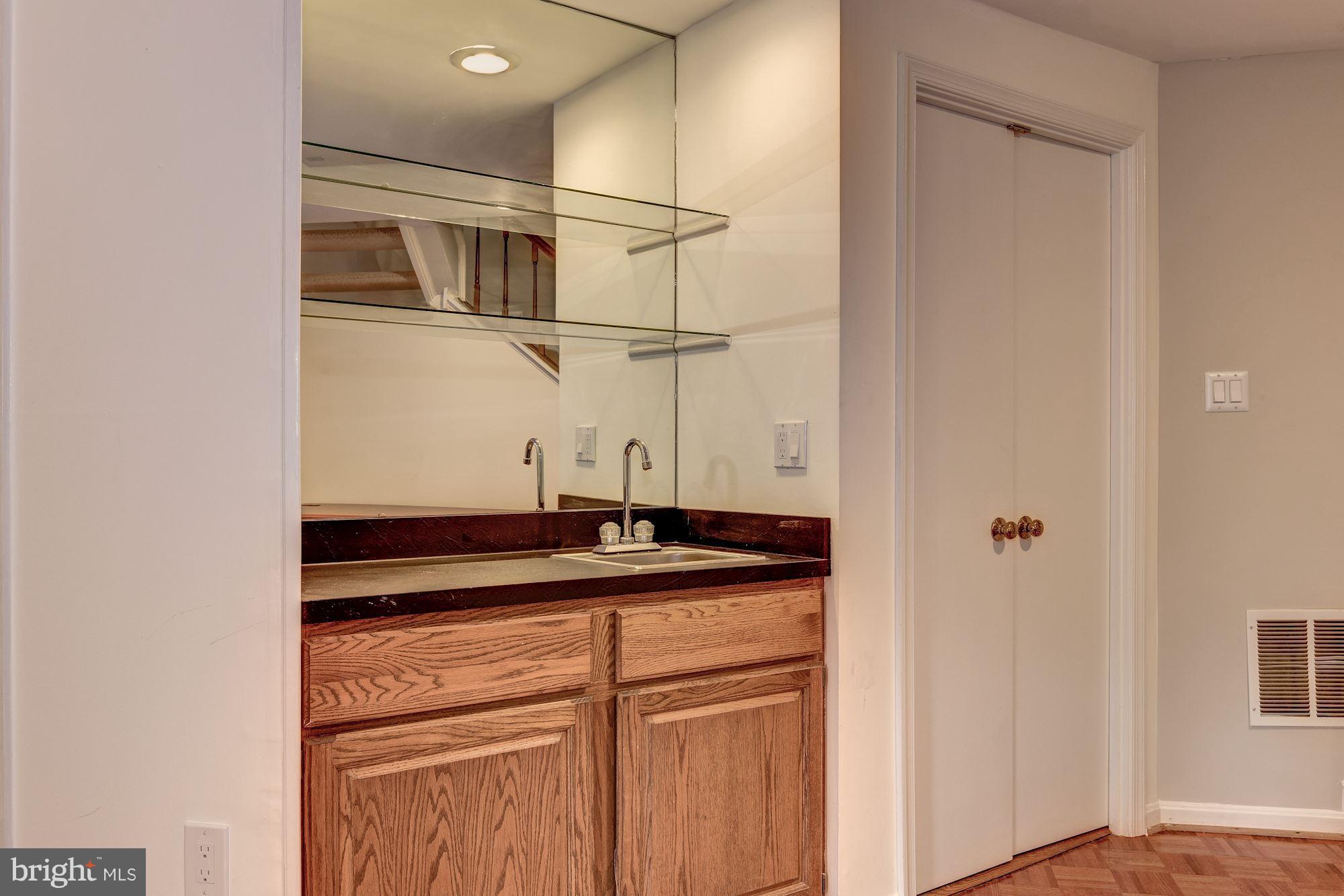 11943 Sentinel Point Court Reston, VA 20191 - Photo 23 of 27 Wet-Bar and Storage Room to the Side