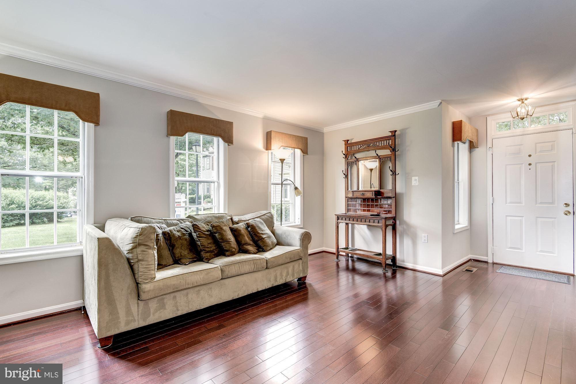 11943 Sentinel Point Court Reston, VA 20191 - Photo 5 of 27 Entrance Opens Up to Living Room