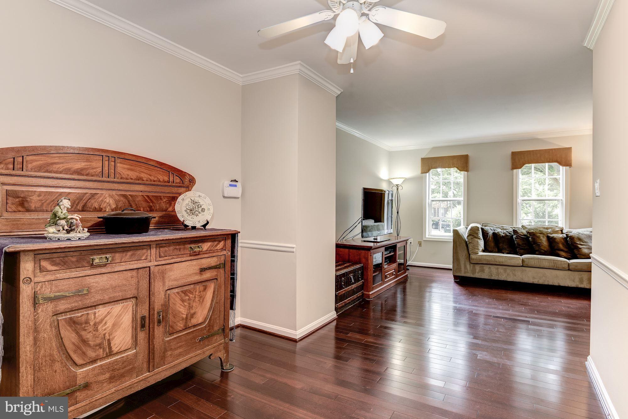 11943 Sentinel Point Court Reston, VA 20191 - Photo 6 of 27 Dining Room w/Ceiling Fan and Chair Railing