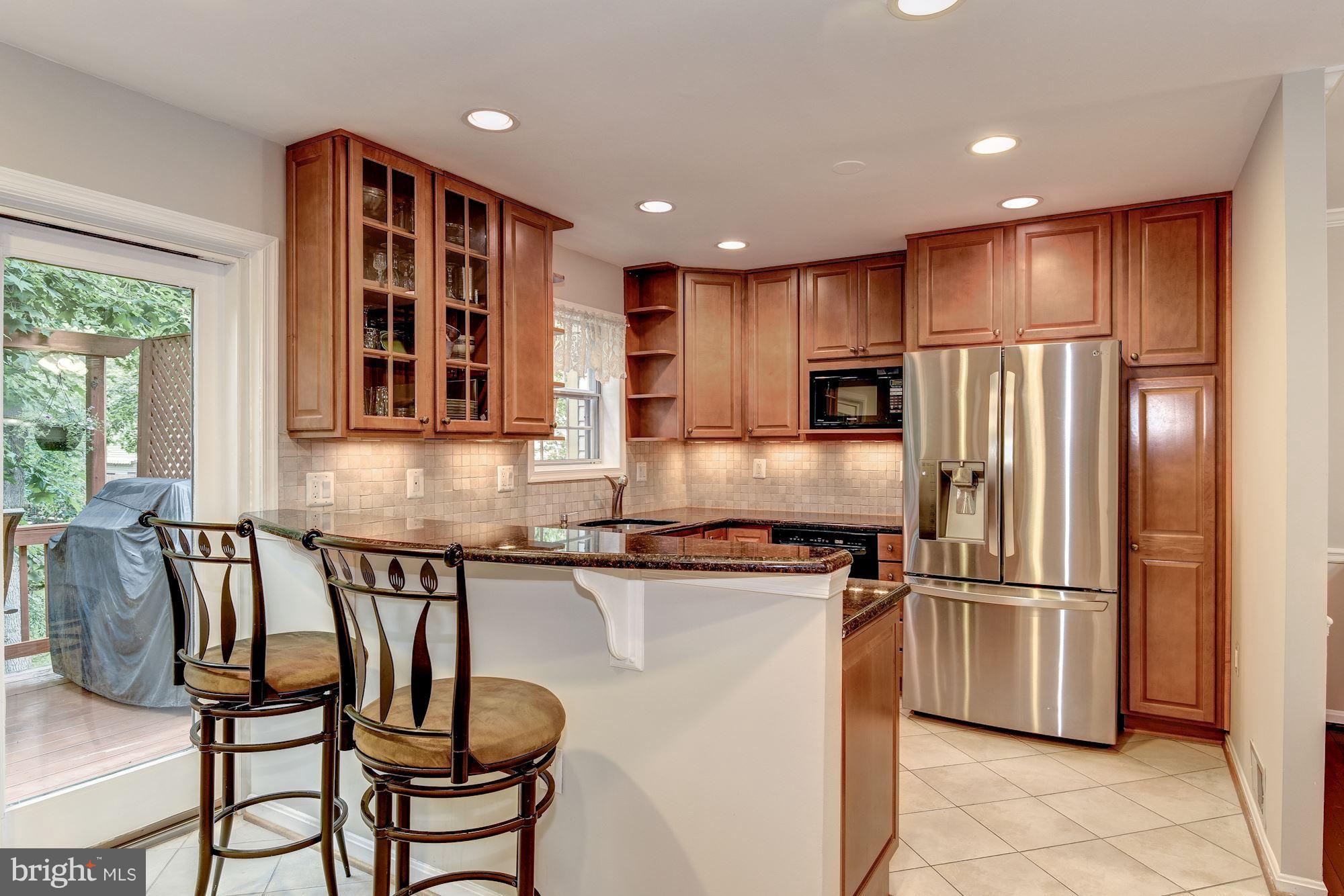 11943 Sentinel Point Court Reston, VA 20191 - Photo 7 of 27 Large Kitchen w/Granite Breakfast Bar