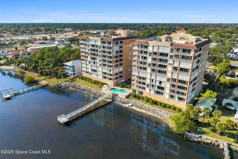 a view of a city with an ocean