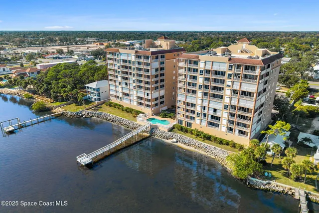 a view of a city with an ocean