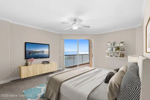 a view of a palm tree from a balcony