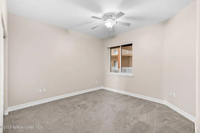a bathroom with a granite countertop sink a toilet and bathtub