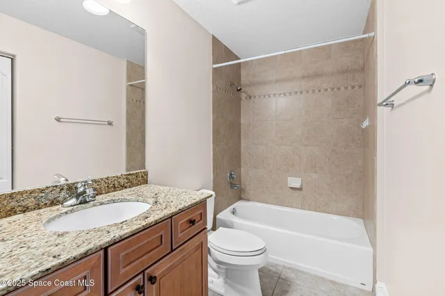 a bathroom with a sink and washing machine