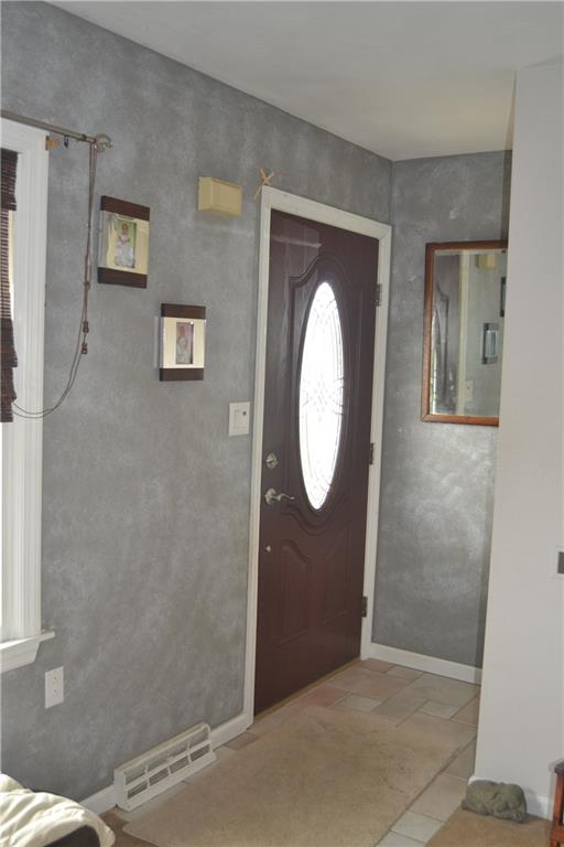 2202 Loucks Road Scottdale, PA 15683 - Photo 12 of 19 Front ceramic tile entrance.