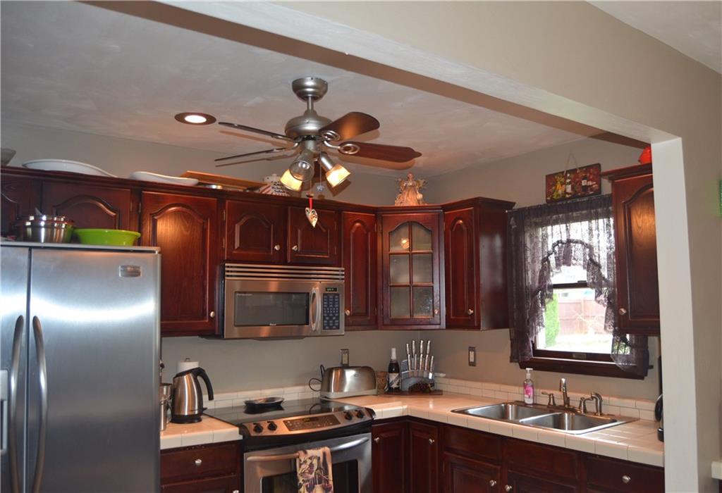 2202 Loucks Road Scottdale, PA 15683 - Photo 8 of 19 Another view of kitchen with plenty of storage.