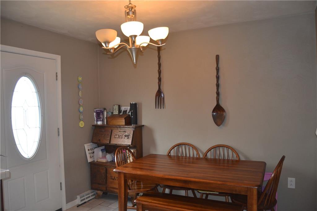 2202 Loucks Road Scottdale, PA 15683 - Photo 9 of 19 Dining area with door to back deck and yard.