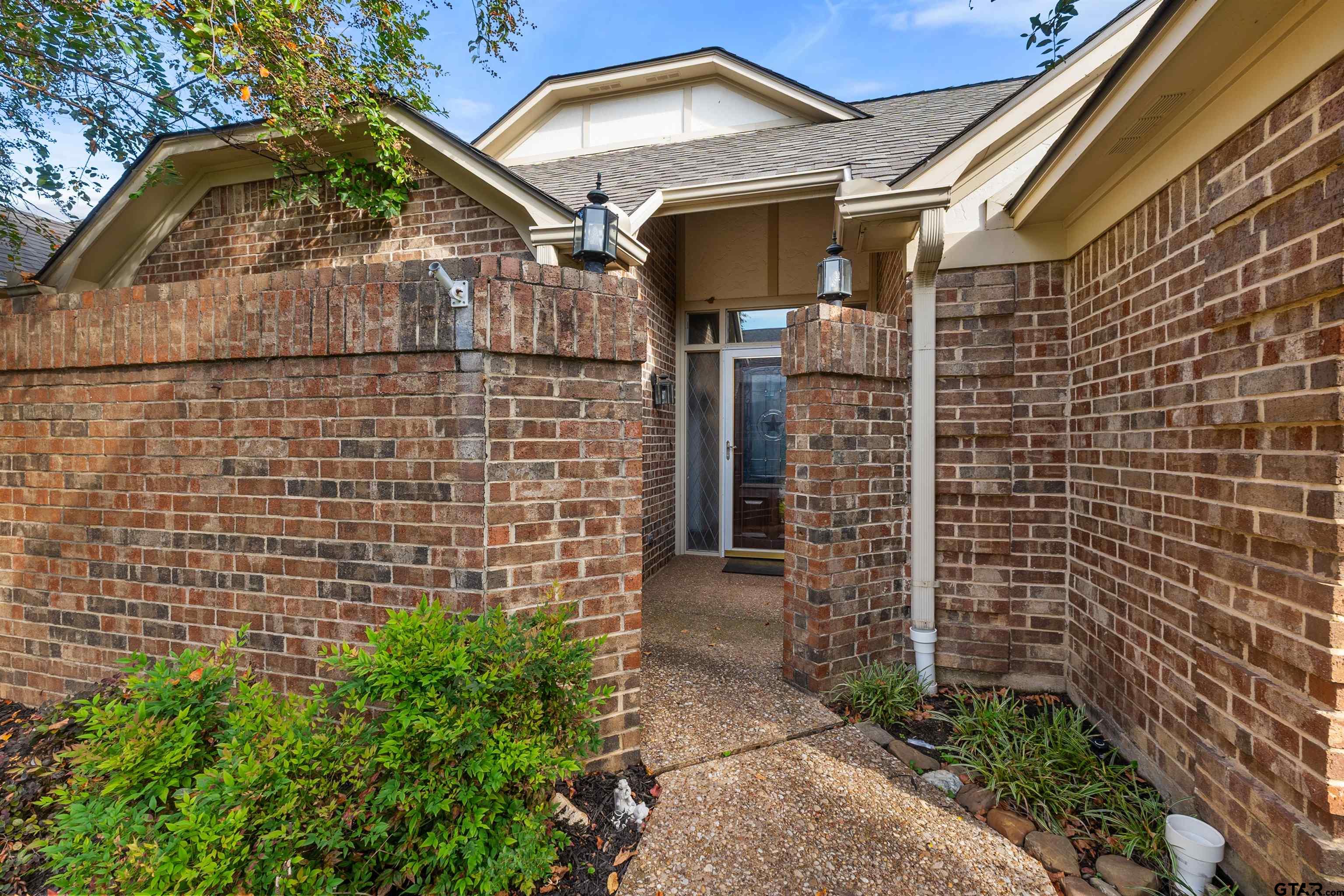 509 Buckingham Place Tyler, TX 75701 - Photo 2 of 35 a bathroom with a shower