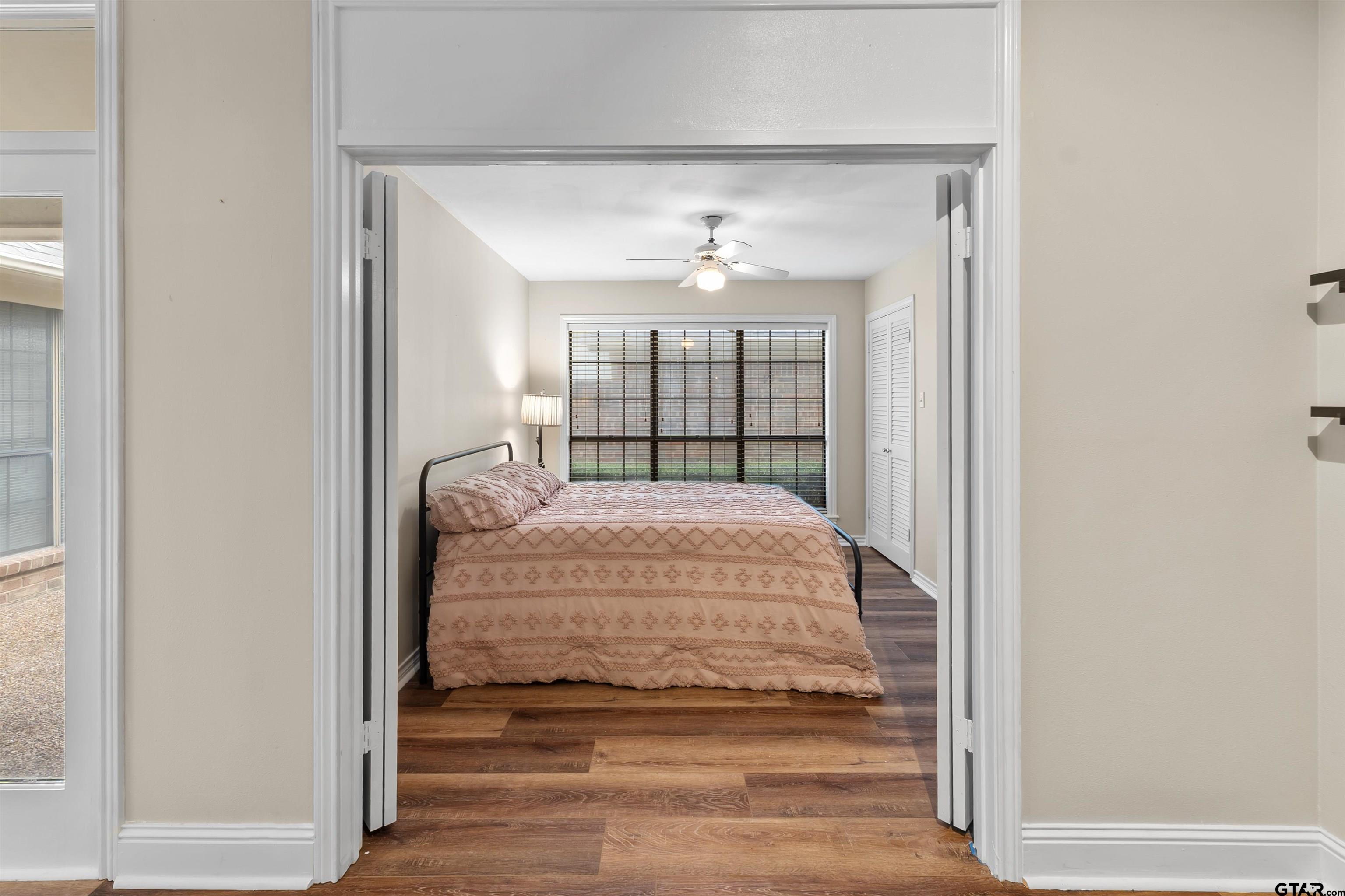 509 Buckingham Place Tyler, TX 75701 - Photo 23 of 35 a view of spacious bedroom with a bed and a window