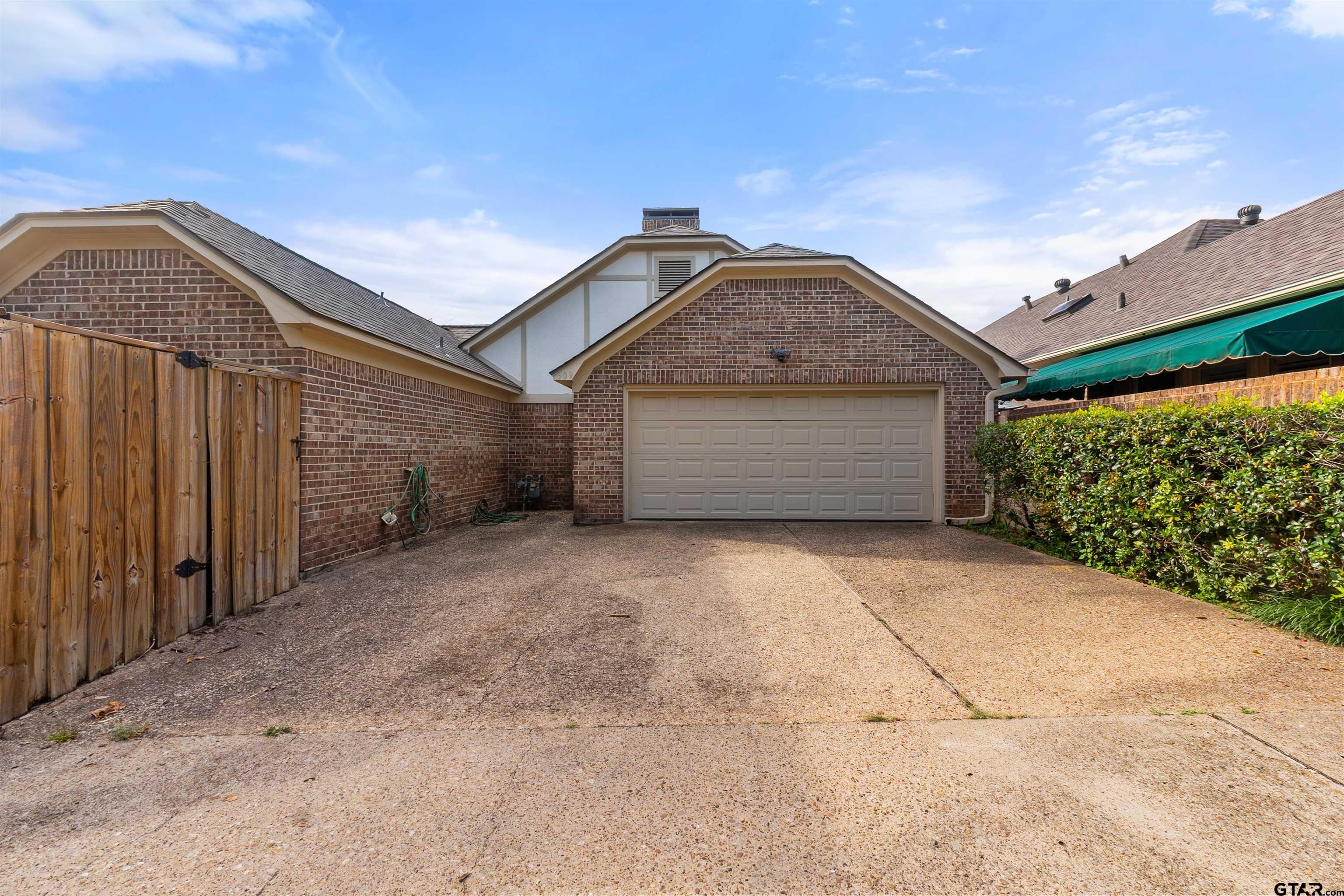509 Buckingham Place Tyler, TX 75701 - Photo 34 of 35 a view of backyard of garage