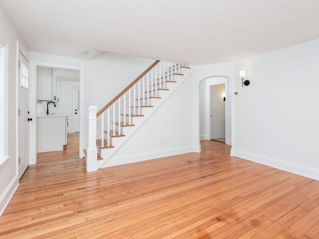 63 Upland Street Worcester, MA 01607 - Photo 14 of 36 a view of an entryway with wooden floor