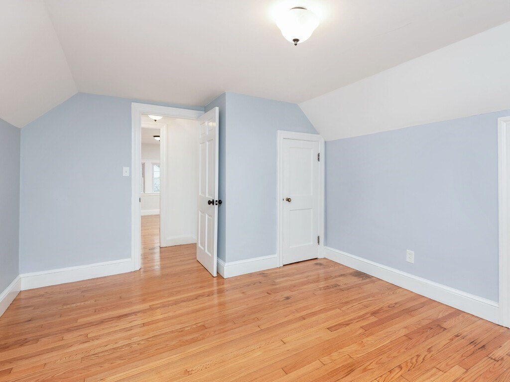 63 Upland Street Worcester, MA 01607 - Photo 21 of 36 wooden floor in an empty room