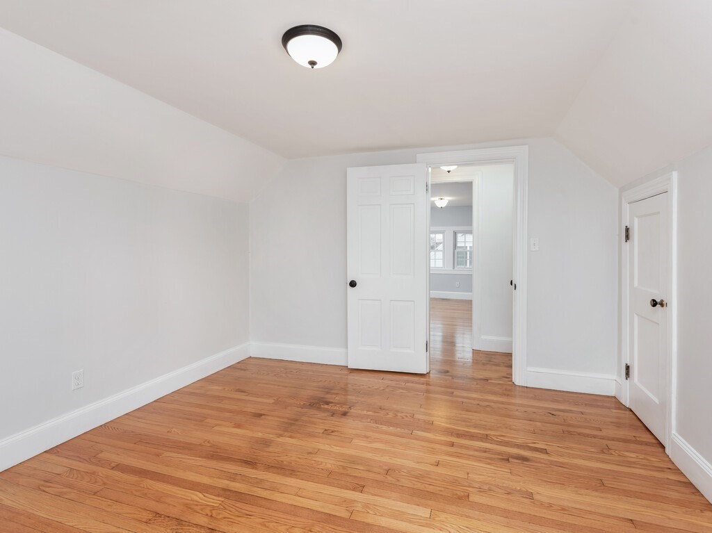 63 Upland Street Worcester, MA 01607 - Photo 23 of 36 wooden floor in an empty room