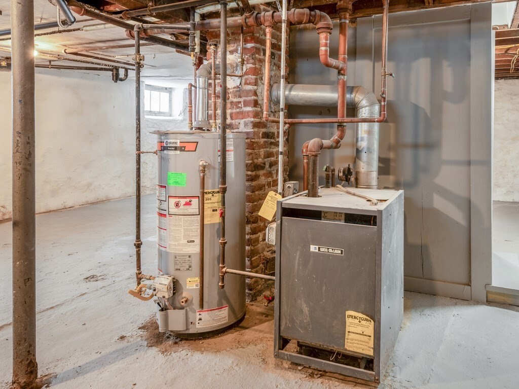 63 Upland Street Worcester, MA 01607 - Photo 26 of 36 a view of water heater room