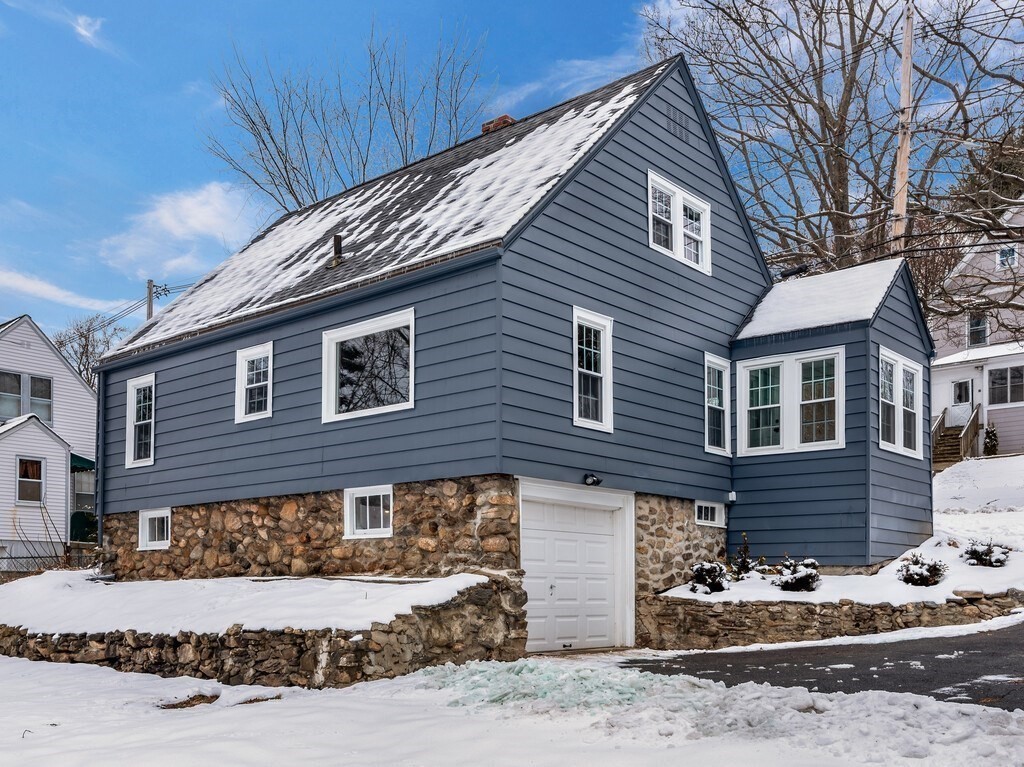 63 Upland Street Worcester, MA 01607 - Photo 30 of 36 a front view of a house with trees