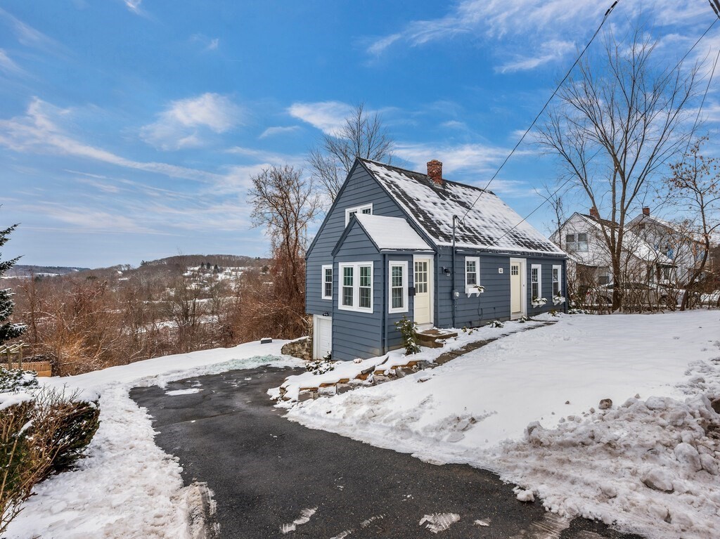 63 Upland Street Worcester, MA 01607 - Photo 36 of 36 a view of house with a yard