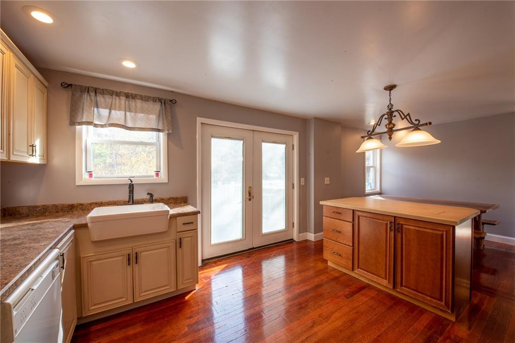 623 Marco Road Apollo, PA 15613 - Photo 13 of 42 a spacious bedroom with a bed and a dresser next to a window