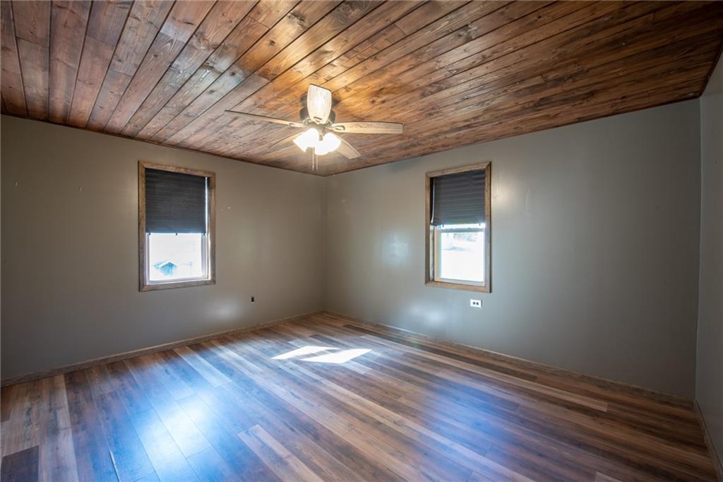 623 Marco Road Apollo, PA 15613 - Photo 17 of 42 a view of an empty room with wooden floor and a window