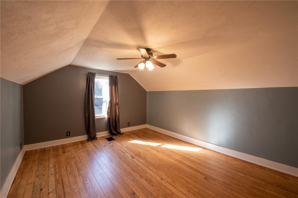 623 Marco Road Apollo, PA 15613 - Photo 23 of 42 wooden floor in an empty room with a window