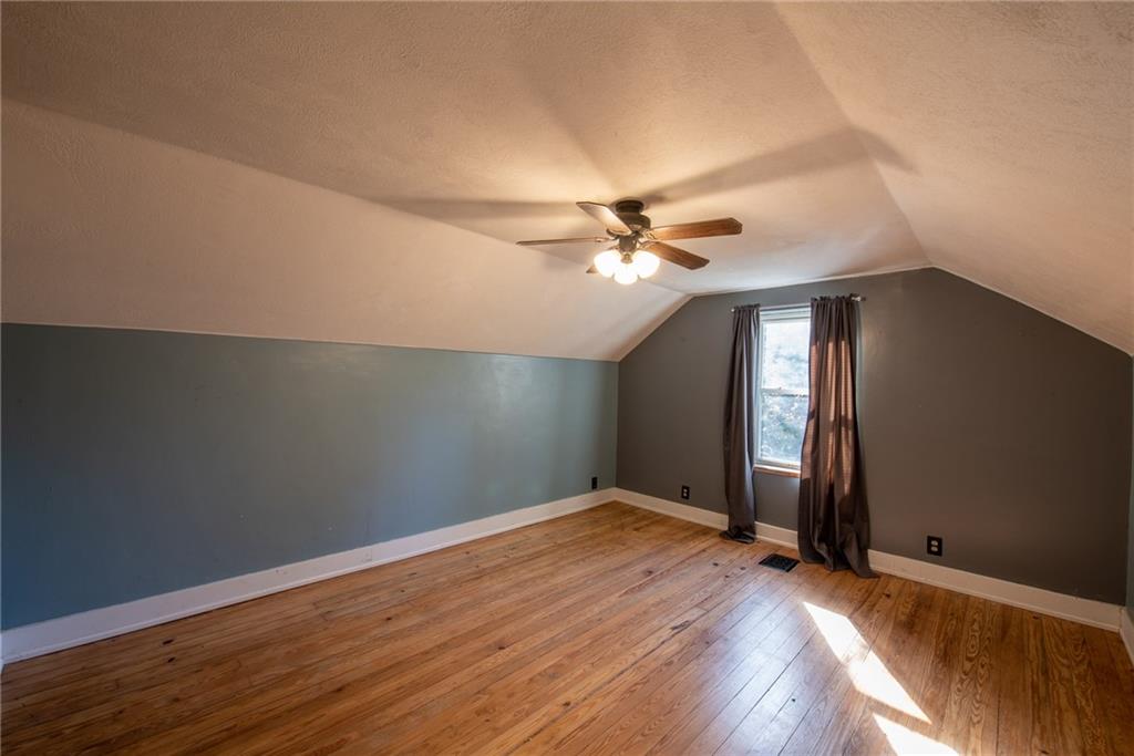 623 Marco Road Apollo, PA 15613 - Photo 26 of 42 wooden floor in an empty room with a window