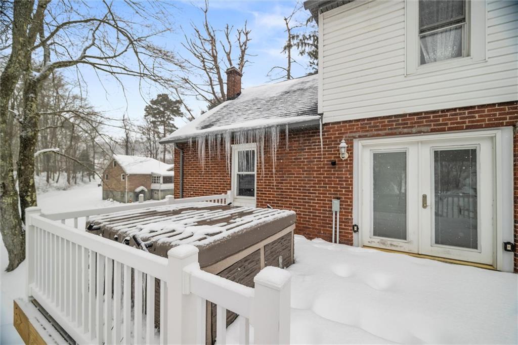 623 Marco Road Apollo, PA 15613 - Photo 29 of 36 a dinning table and chairs in front of a house