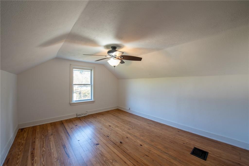 623 Marco Road Apollo, PA 15613 - Photo 31 of 42 wooden floor in an empty room with a window