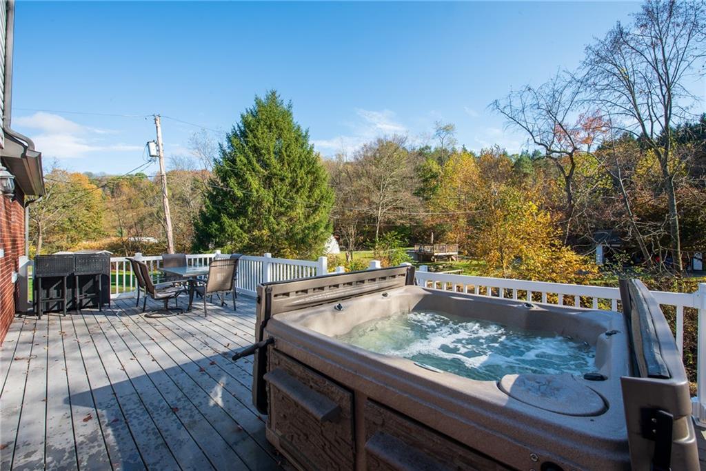 623 Marco Road Apollo, PA 15613 - Photo 33 of 42 a view of a swimming pool with a patio and wooden flooring