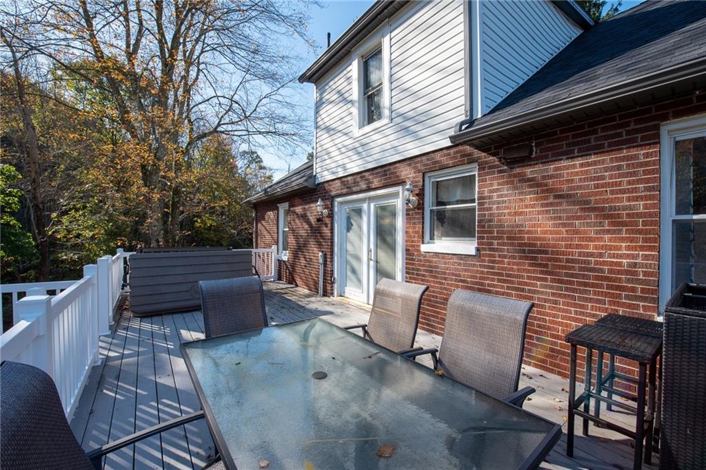 623 Marco Road Apollo, PA 15613 - Photo 35 of 42 a wooden bench sitting in front of a building