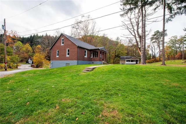 a house view with a garden space