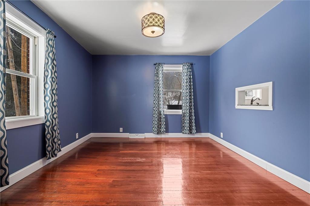 623 Marco Road Apollo, PA 15613 - Photo 4 of 36 a view of a room with wooden floor and window