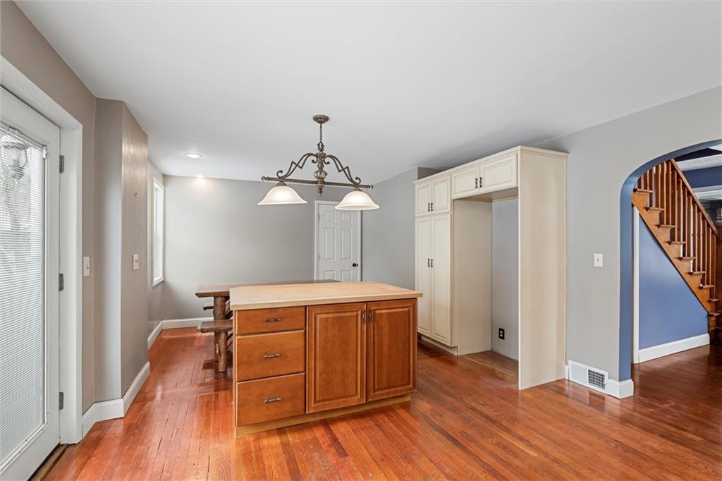 623 Marco Road Apollo, PA 15613 - Photo 7 of 36 a view of a room with wooden floor and chandelier