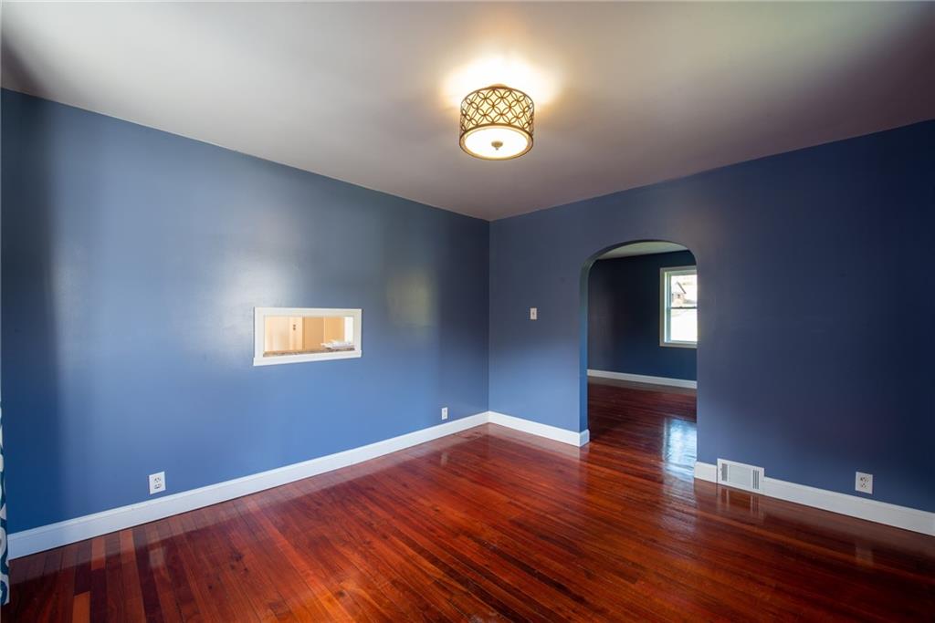 623 Marco Road Apollo, PA 15613 - Photo 7 of 42 a view of empty room with wooden floor
