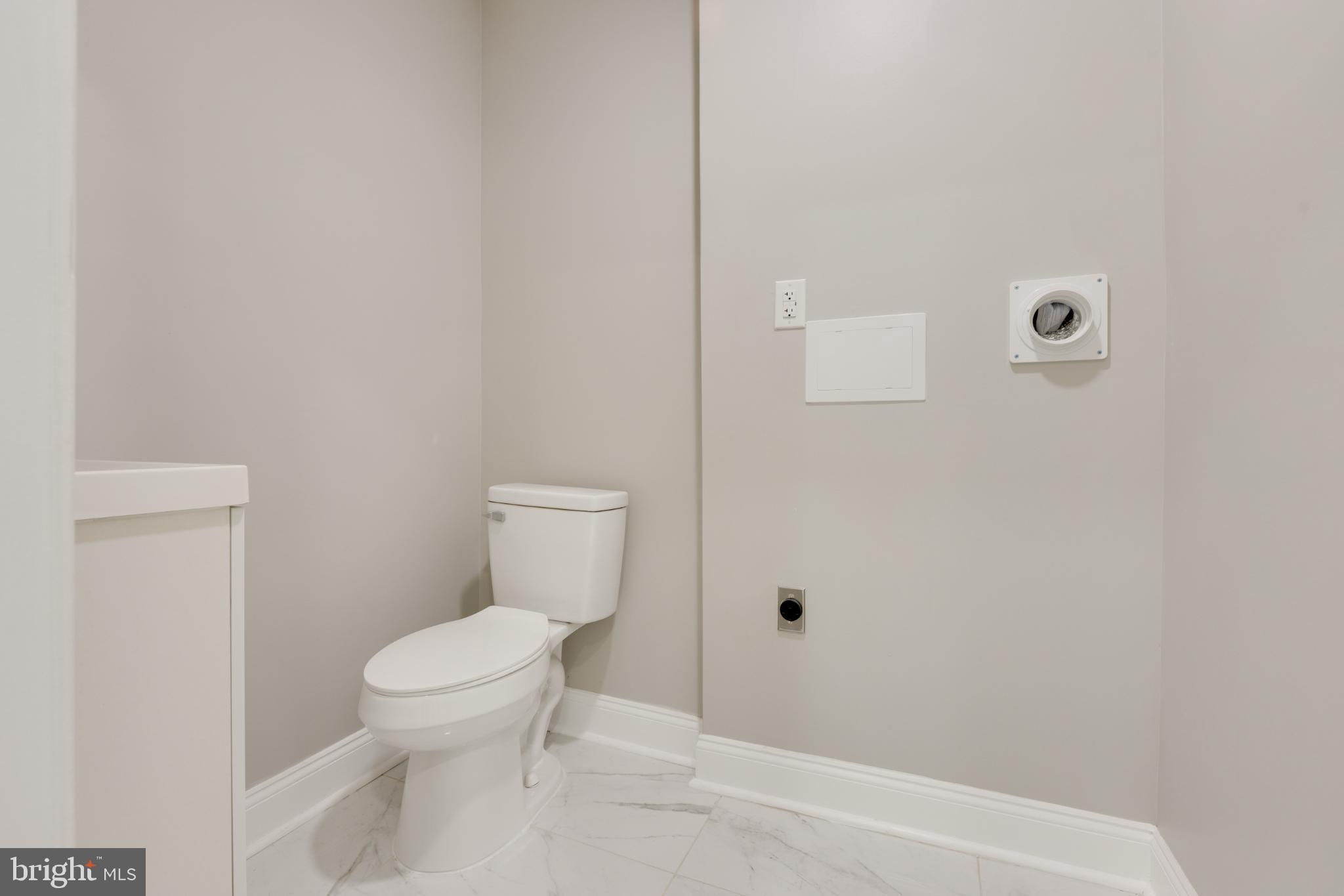 5239 Arch Street Philadelphia, PA 19139 - Photo 11 of 36 Sleek and modern 1st floor half-bath retreat.