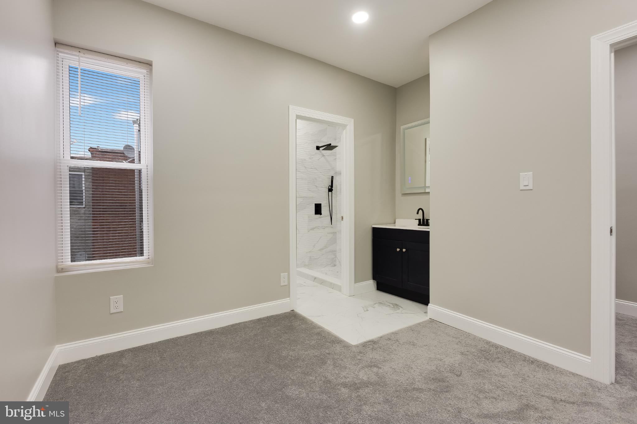 5239 Arch Street Philadelphia, PA 19139 - Photo 21 of 36 Modern retreat with sleek bathroom design.