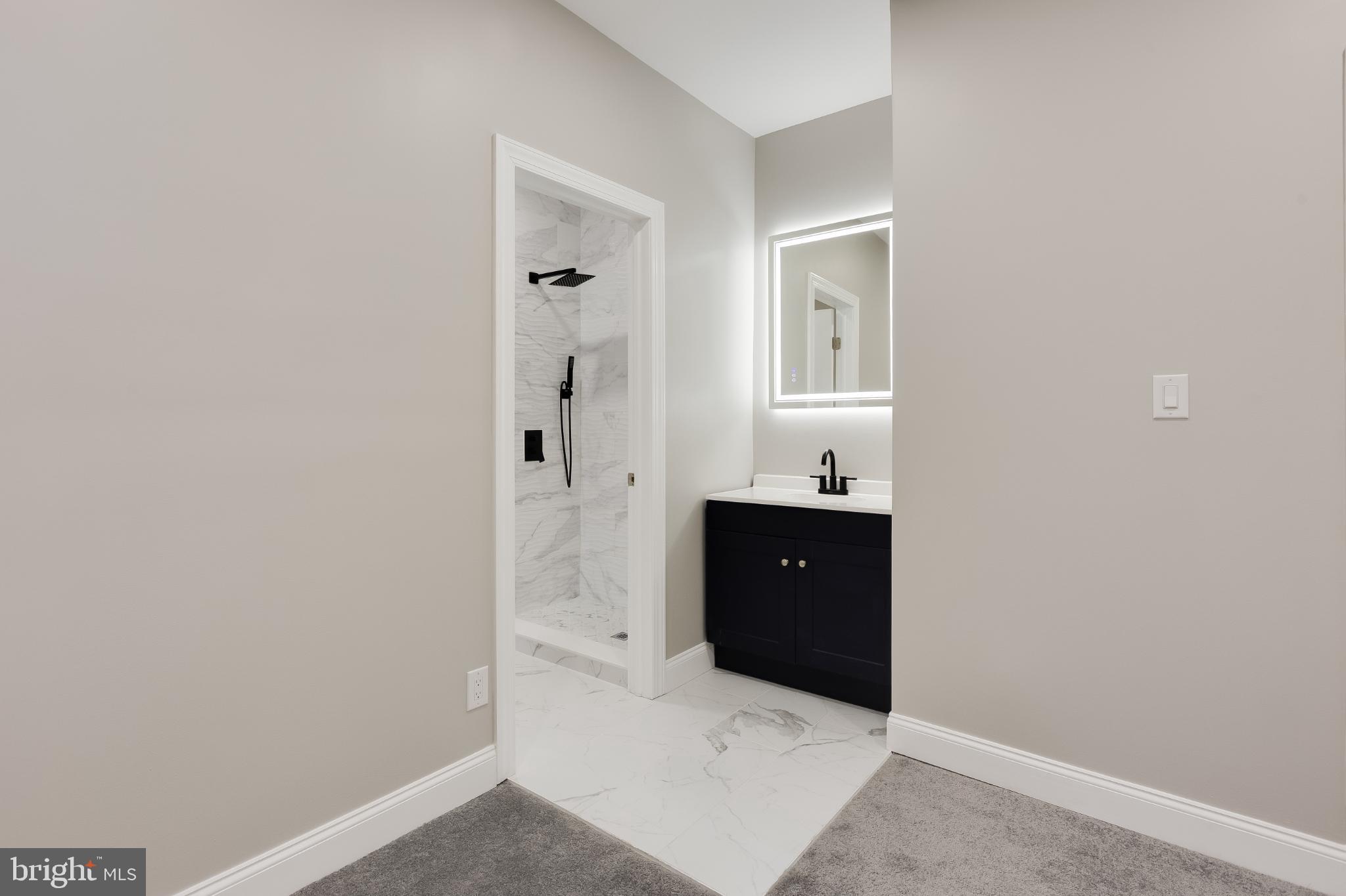5239 Arch Street Philadelphia, PA 19139 - Photo 22 of 36 Sleek modern bathroom with elegant finishes.