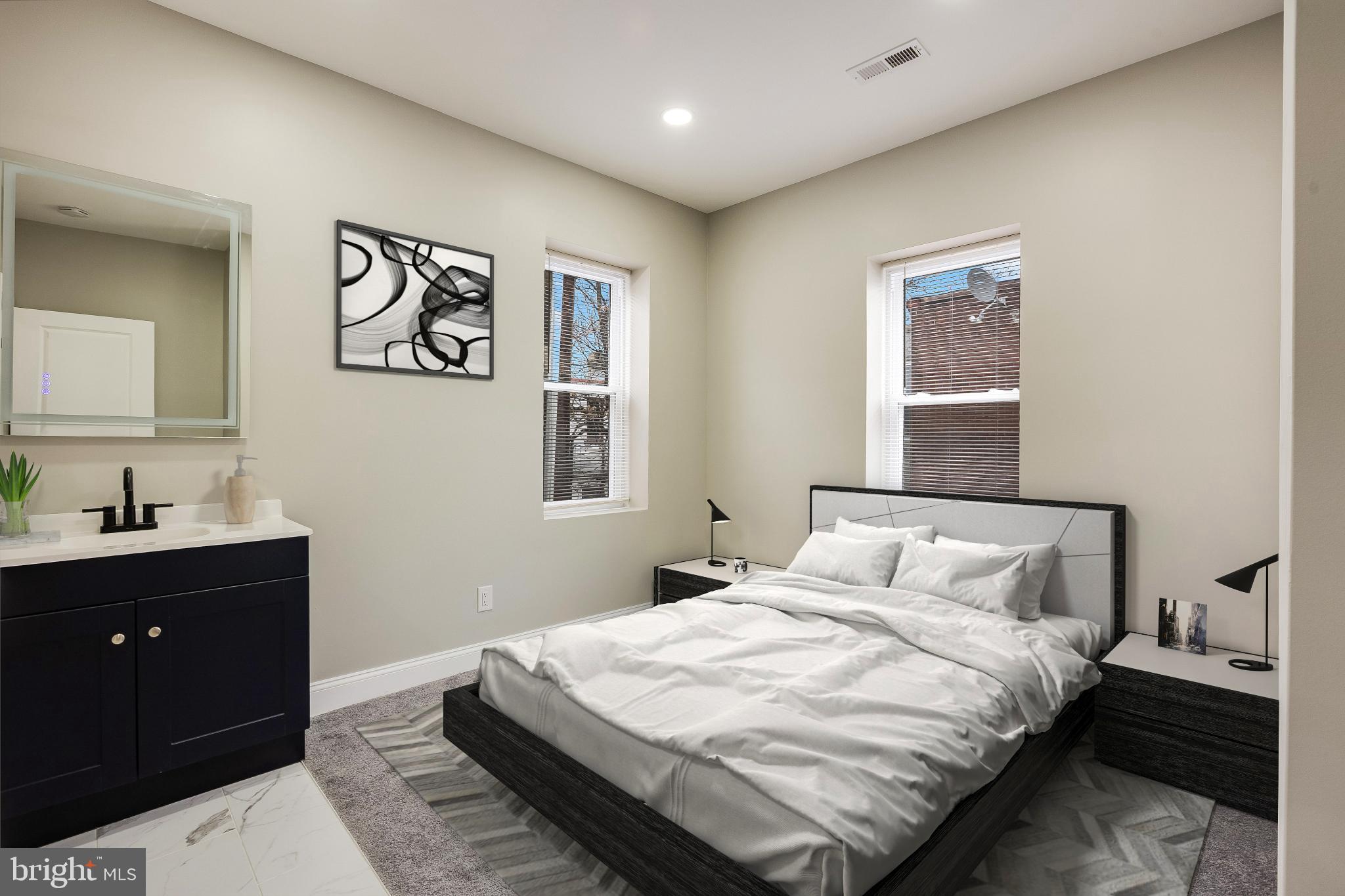 5239 Arch Street Philadelphia, PA 19139 - Photo 27 of 36 Modern bedroom with natural light and style.