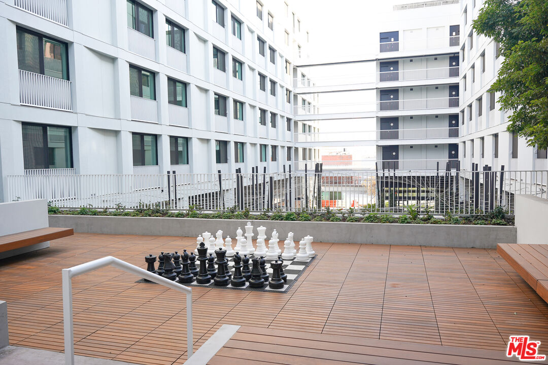 200 Mesnager Street, Unit 618 Los Angeles, CA 90012 - Photo 15 of 24 a view of a brick building with many windows