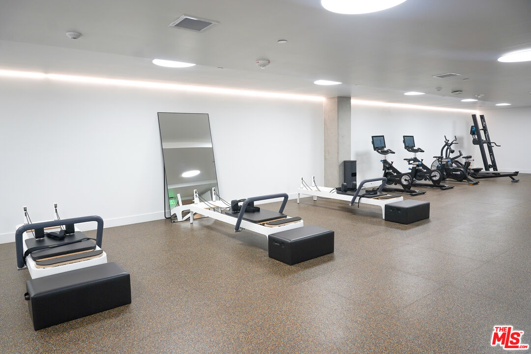 200 Mesnager Street, Unit 618 Los Angeles, CA 90012 - Photo 24 of 24 a living room with furniture