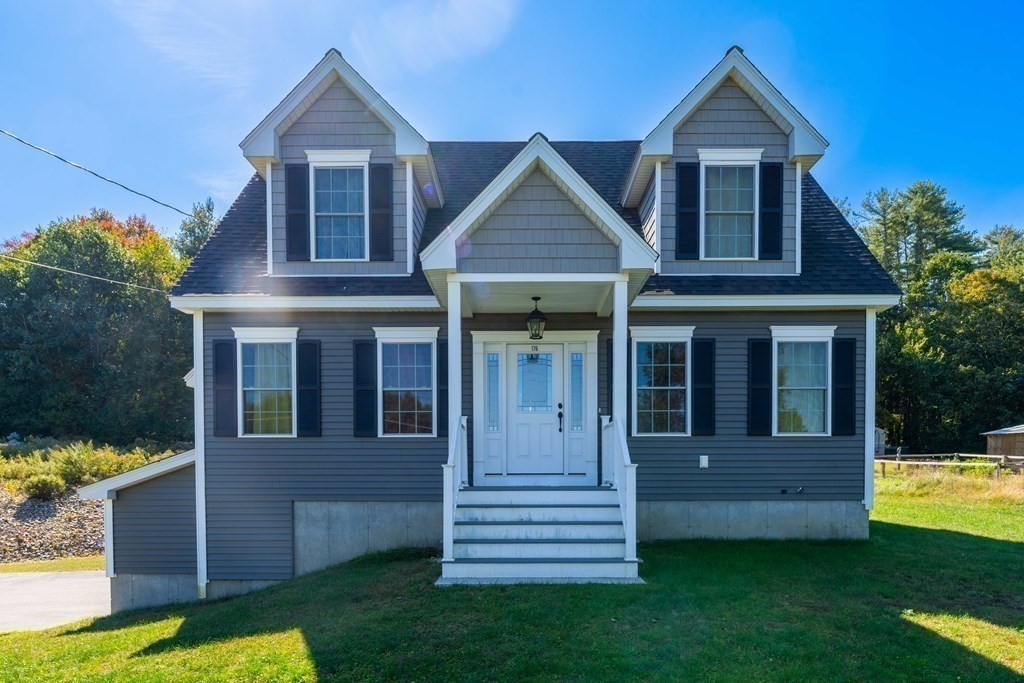 176 Oakham Road Barre, MA 01005 - Photo 13 of 36 a front view of a house with a yard
