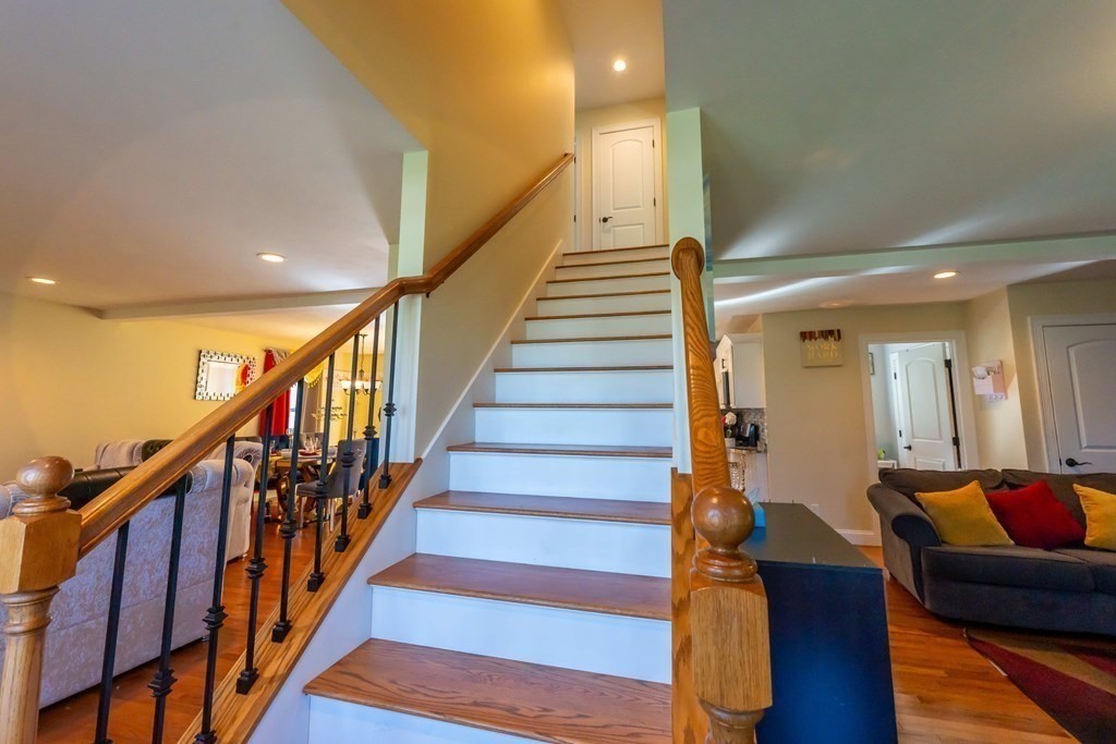 176 Oakham Road Barre, MA 01005 - Photo 15 of 36 a view of staircase with wooden floor and stairs