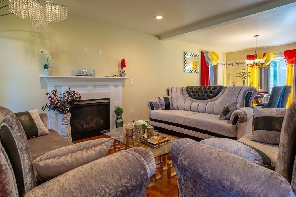 176 Oakham Road Barre, MA 01005 - Photo 18 of 36 a living room with furniture and a fireplace