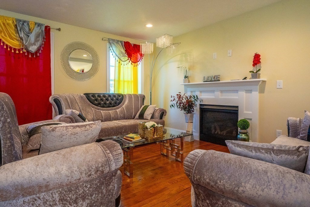 176 Oakham Road Barre, MA 01005 - Photo 19 of 36 a living room with furniture and a fireplace