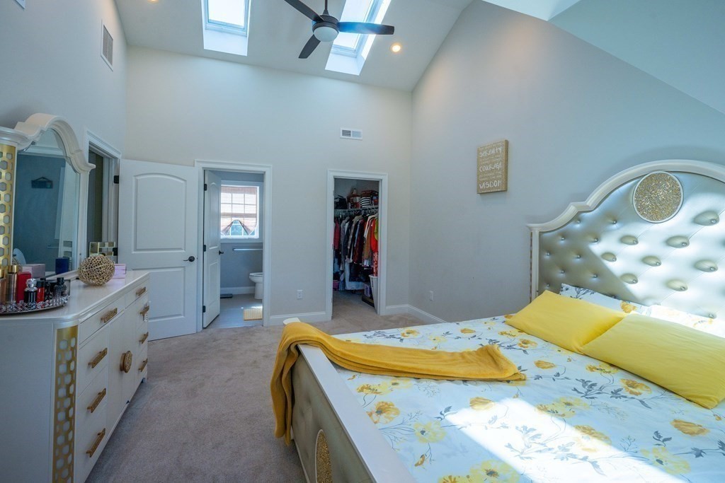 176 Oakham Road Barre, MA 01005 - Photo 28 of 36 a bedroom with a bed and a bathroom