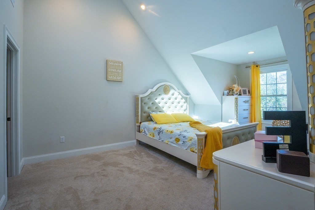 176 Oakham Road Barre, MA 01005 - Photo 29 of 36 a bed room with a bed and a tv