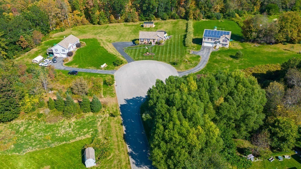176 Oakham Road Barre, MA 01005 - Photo 4 of 36 an aerial view of a house having yard