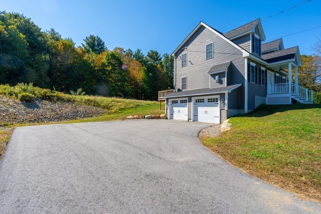 176 Oakham Road Barre, MA 01005 - Photo 6 of 36 a view of house with outdoor space and yard