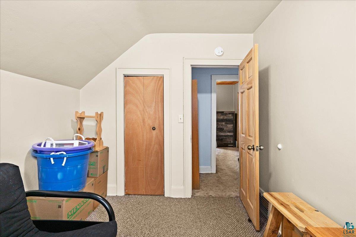 4316 West 6th Street Duluth, MN 55807 - Photo 31 of 39 Office area with carpet flooring and vaulted ceiling
