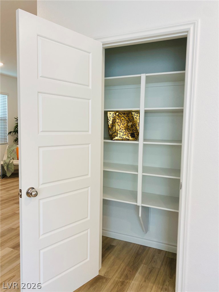 4457 Sawyer Ridge Street Las Vegas, NV 89147 - Photo 17 of 32 This spacious pantry provides ample storage for all your culinary needs.